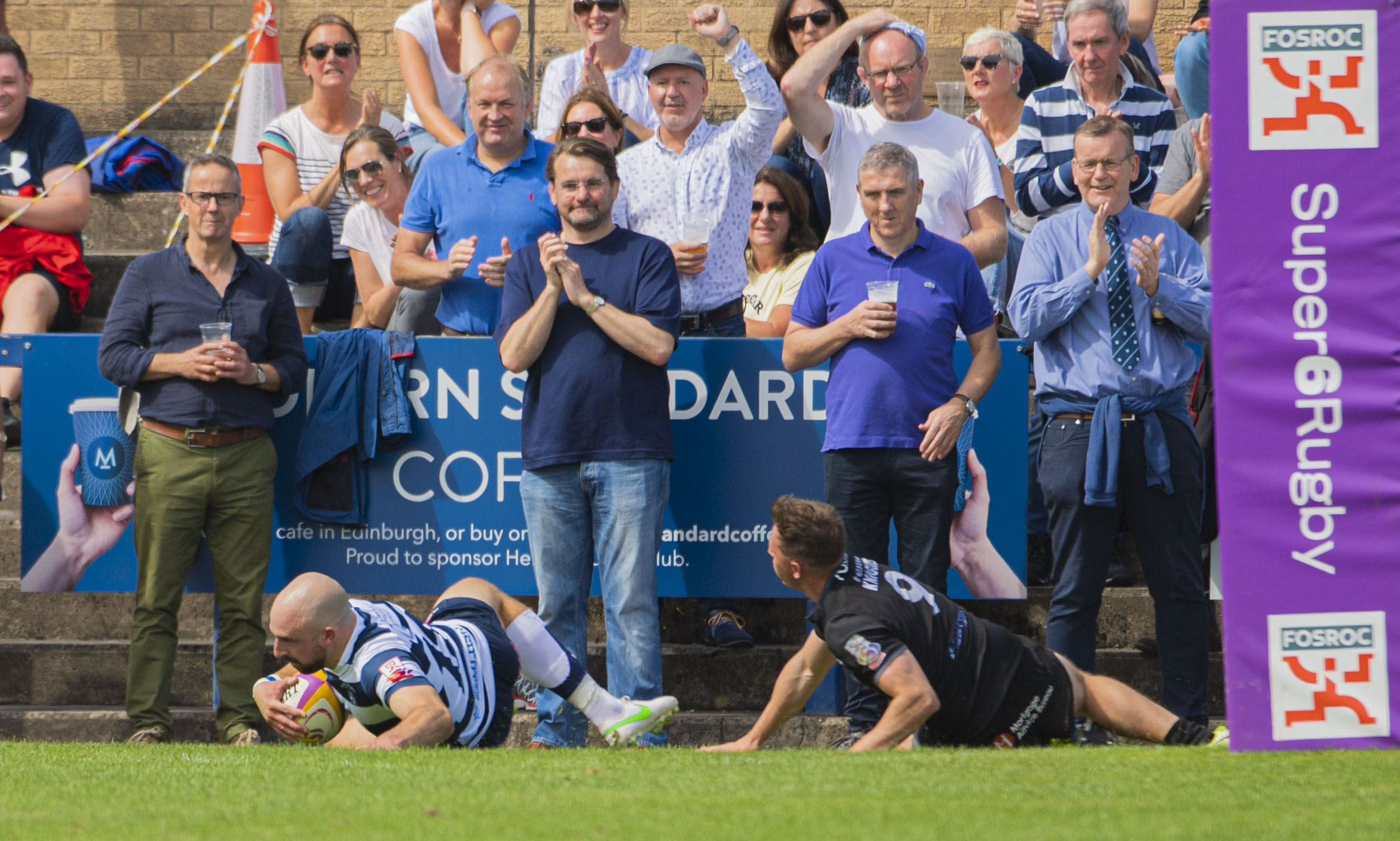 EDINBURGH, SCOTLAND - AUGUST 08: Heriot's Stuart Edwards with a try in front of the fans during a FOSROC Super6 match between Heriot's and Southern Knights at Heriot's Rugby Club, on August 08, 2021, in Edinburgh, Scotland. (Photo by Paul Devlin / SNS Group)